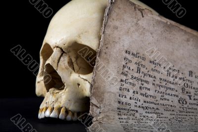 cranium and old manuscript