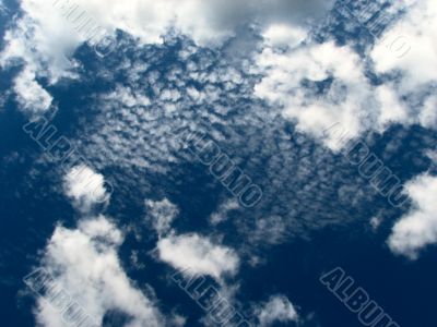 Dark-blue sky with clouds