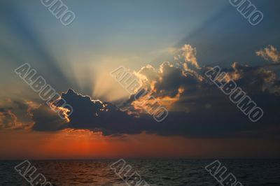 Beams of the sun above the sea.