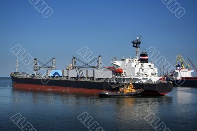 The ship and  tugboat