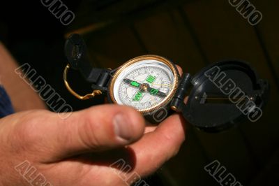 Compass in a hand Compass in a hand
