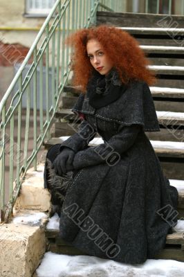 Portrait of the girl with red hair