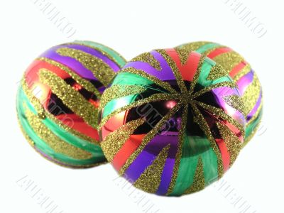 Three multi-coloured christmas spheres