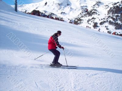 Girl on mountain skis