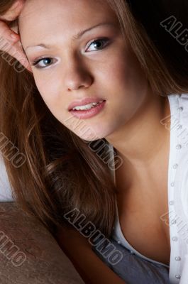 wistful glance of quiet pretty woman