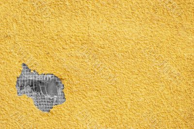yellow punched stucco