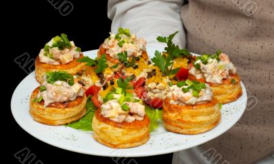 tartlets with salad on dish