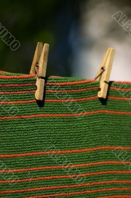 carpet pegged to a clothesline