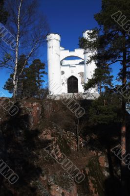 Fragment of landscape park with a chapel