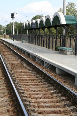 Railway station, rails and cross ties