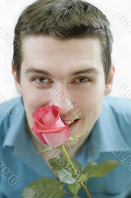 young man with a rose