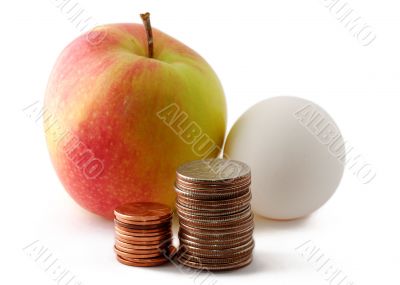 Red green apple and egg with coins