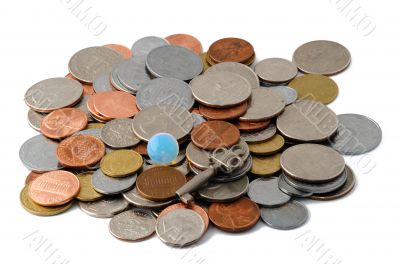 Stack of coins with glass sphere