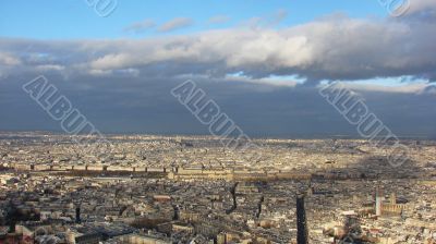 Panorama of Paris with a kind on the Louvre