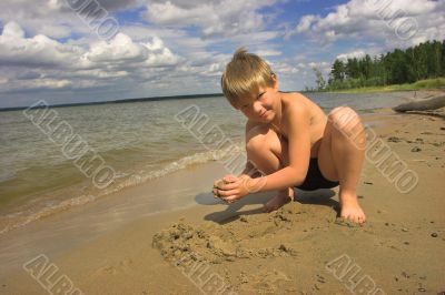 boy, sea and cloudy sky boy, sea and cloudy sky