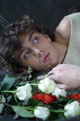 The young man with roses