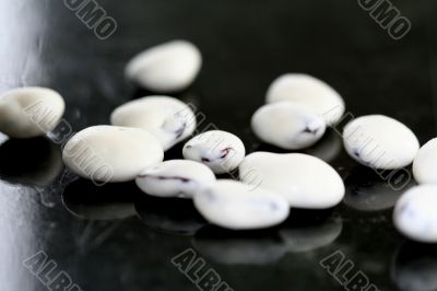 Yogurt covered raisins on black