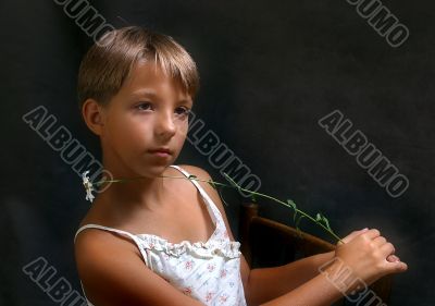 Portrait with a camomile