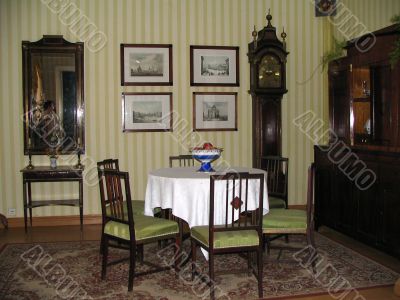 Interior of a dining room of 19-th century