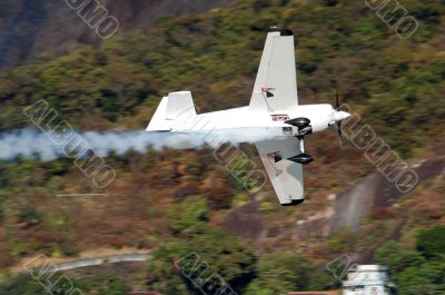 Smoke White Airplane in motion