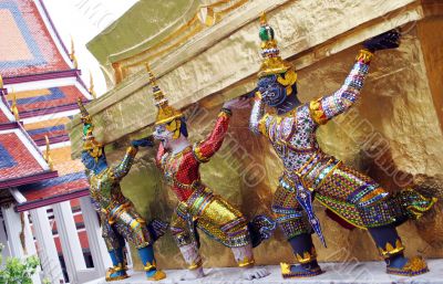 Statues at the Grand Palace, Bangkok, Thailand.