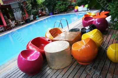 Funky furniture by the poolside Funky furniture by the poolside