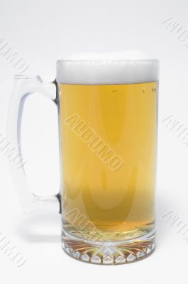 A glass mug of ice cold beer.