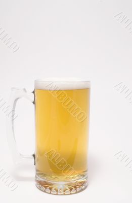 A glass mug of ice cold beer.