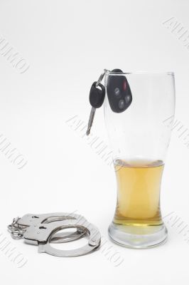 Beer, Keys and Handcuffs - Drunk Driving Concept