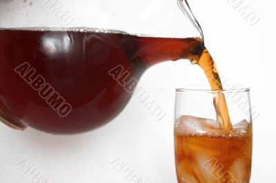 pouring a delicious glass of iced tea
