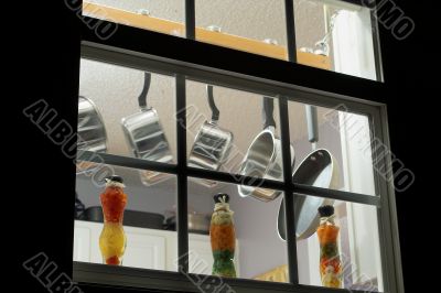 pots and pans in a kitchen window