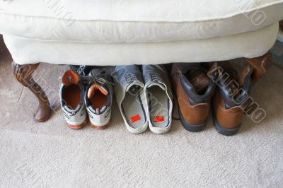a families shoes lined up in a row