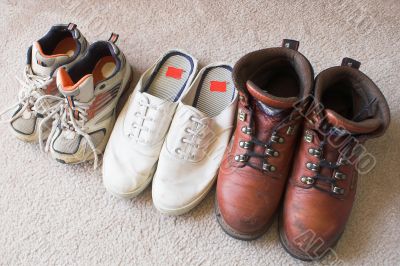 a families shoes lined up in a row
