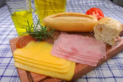 Snack with bread, cheese, ham and juice