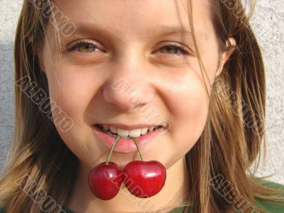 The girl with a sweet cherry