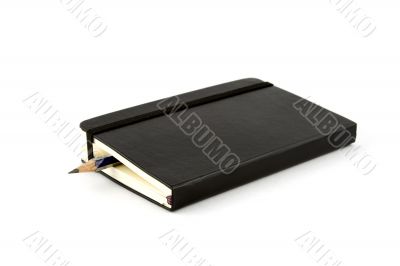 Notebook with pencil inside