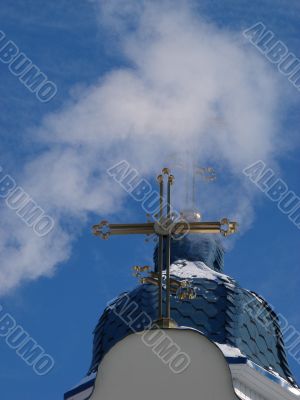 Church Crosses inside white cloud on blue sky