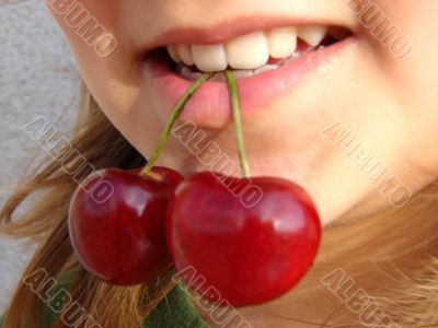 The girl with a sweet cherry
