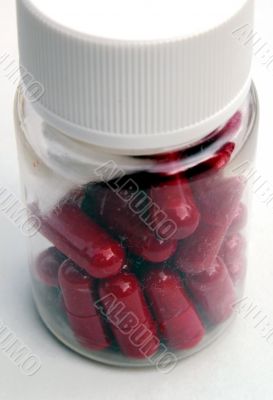 Capsules in bottle