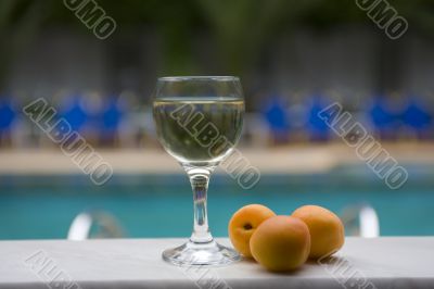 Glass of wine with peaches