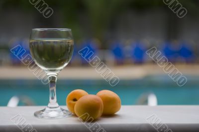 Glass of wine with peaches