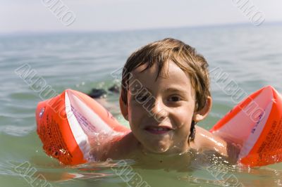 Boy learns swimming