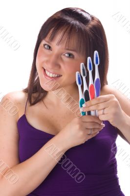 Girl with tooth brushes