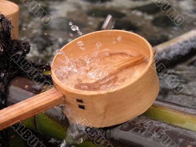 Splashes in a bamboo ladle