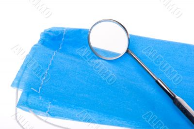 Dental mirror and surgical scrub