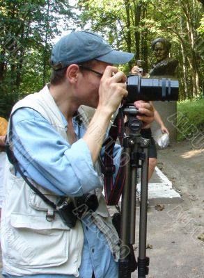 Outdoor photographer on the mission Outdoor photographer on the mission