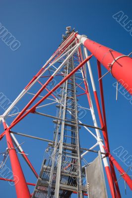 Radio mast against blue sky