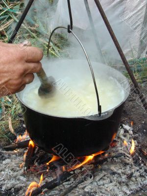 Tourist boiler upon opened wood fire