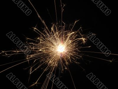 Bright light of sparkling holiday pyrotechnic