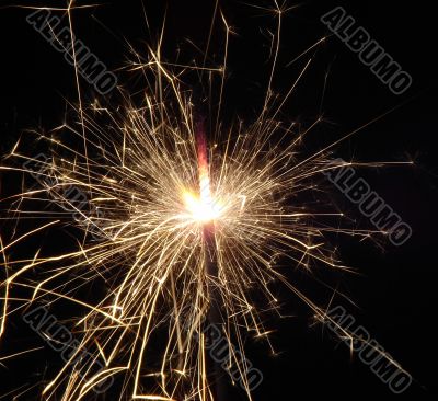 Bright light of sparkling holiday pyrotechnic